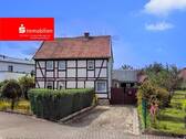 Strassenansicht - 6 Zimmer Einfamilienhaus zum Kaufen in Am Ohmberg
