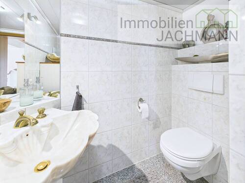 Hauptwohnung Gäste-WC im EG - 