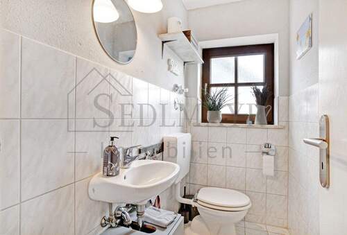 Ansicht Gäste WC - Etagenwohnung mit 106,60 m² in Westendorf zum Kaufen