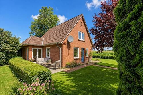 Außenansicht mit Terrasse - Einfamilienhaus mit 115,00 m&sup2; in Risum-Lindholm zum Kaufen