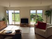 Wohnzimmer EG - 5 Zimmer Doppelhaushälfte in Seevetal - Ohlendorf
