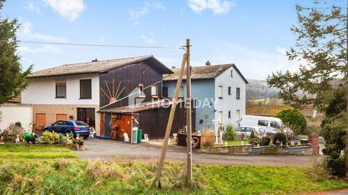 Außenansicht 3 - 9 Zimmer Einfamilienhaus zum Kaufen in Lollar