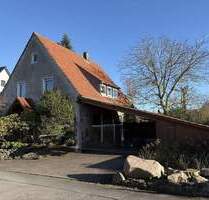 Zweifamilienhaus mit großem Garten in ruhiger Wohngegend von Lage-Pottenhausen