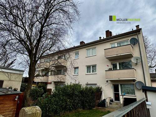 Gartenansicht - 9-Familienhaus mit Terrassen, Garten und Balkonen in Köln-Urbach