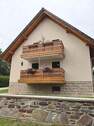Hausansicht von der Seite - 2 Zimmer Etagenwohnung in Thalheim/Erzgebirge