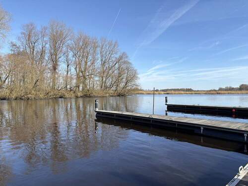  Anleger - Ferienhaus unter Reet mit 12m Bootsliegeplatz -Traumblick und Ruhe garantiert