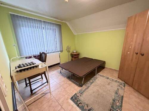 Zimmer 1 - Mehrfamilienhaus, Wohnhaus mit 200,00 m&sup2; in Bremen / Rekum zum Kaufen