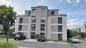 Hauseingangsseite - Top-DG-Apartment - optional bei Vermietung Mietzins 4,2%