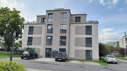 Hauseingangsseite - Top-DG-Apartment - optional bei Vermietung Mietzins 4,2%