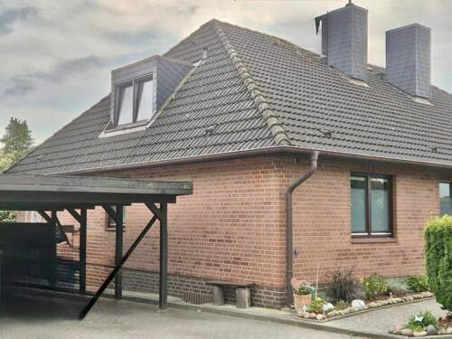 Ansicht mit Carport - 