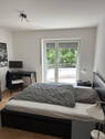Schlafzimmer mit Balkon - 