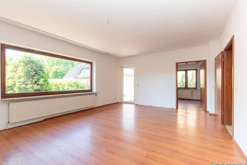 Wohnzimmer - 5 Zimmer Einfamilienhaus zum Kaufen in Wasbek