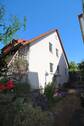 Giebelseite mit Rundumgarten - 
