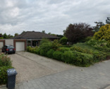 seitliche Gebäudefront / Garage - 