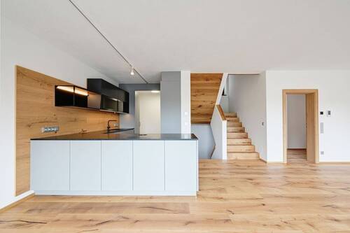 Die maßgefertigte Designerküche von Almer Möbel Manufaktur mit Induktionsfeld und Abzugssystem von BORA - 