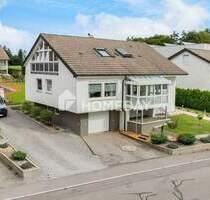 Vielseitiges Einfamilienhaus mit Einliegerwohnung und zzgl. Baugrundstück - Hausen ob Verena