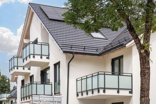 Fassade - Bestlage in München: 4-Zimmer-Gartenwohnung mit zwei Terrassen und Südwest-Ausrichtung