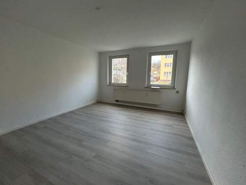 Wohnzimmer Wohnung 1 im EG links - 