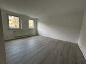 Wohnzimmer Wohnung 1 im EG links - 