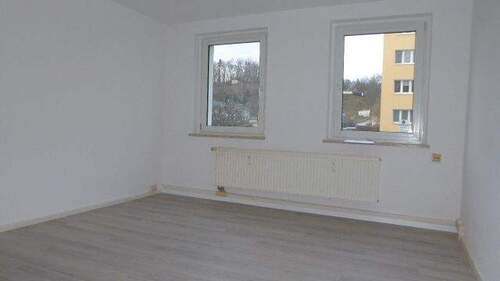 Wohnzimmer Wohnung 1 im EG links - 