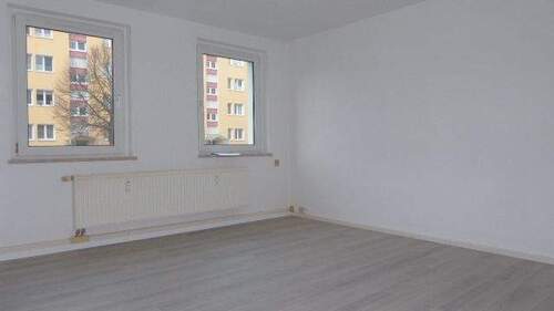 Wohnzimmer Wohnung 1 im EG links - 