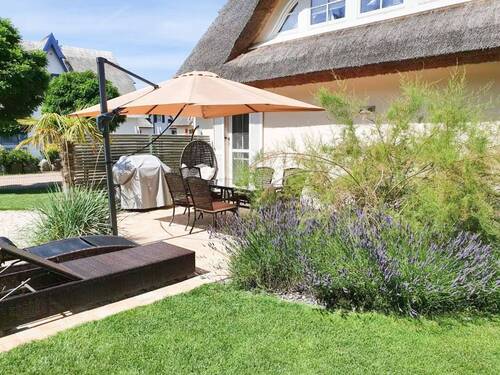 Die sonnige Terrasse in Richtung Süden - Einfamilienhaus mit 98,00 m² in Glowe zum Kaufen