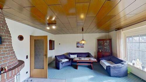 Wohnzimmer - Einfamilienhaus mit 148,40 m&sup2; in Nienhagen zum Kaufen