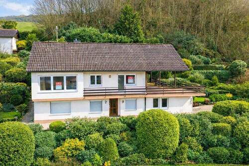 Titelbild - Einfamilienhaus mit Einliegerwohnung und Aussicht in Lörrach-Brombach