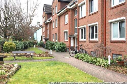 01 Objektansicht Vorderseite - 2 Zimmerwohnung mit Hobbykeller und Duplex Parker