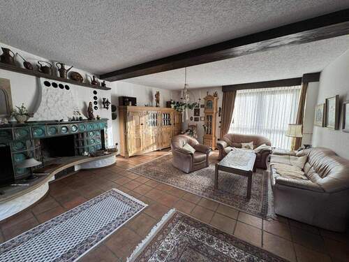 Wohnzimmer - 4 Zimmer Einfamilienhaus zum Kaufen in Korschenbroich