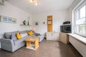 Wohnzimmer - 2 Zimmer Etagenwohnung zum Kaufen in Borkum