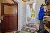 Zwischenraum mit Ausgang zum Garten - 