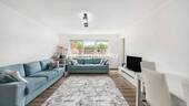 Wohnzimmer 1 - Sanierte Wohnung mit hellen Räumen, KFZ-Stellplatz, Balkon, neuer Heizung & Küche