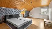 1. OG Schlafzimmer 1 - 