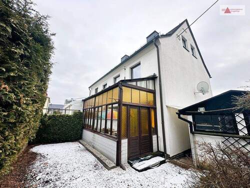 Gartenansicht - Doppelhaushälfte mit 110,00 m² in Chemnitz / Rabenstein zum Kaufen