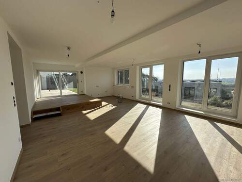 Wohn-/Essbereich mit offener Küche - 