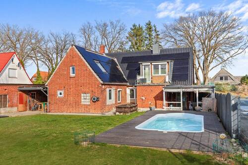 Gartenansicht - 7 Zimmer Einfamilienhaus zum Kaufen in Winsen (Luhe)