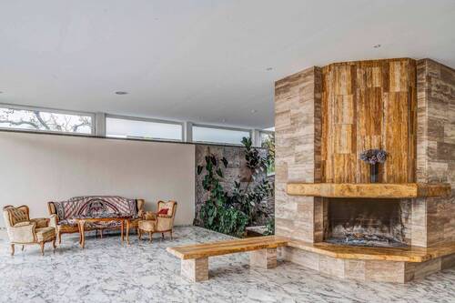 Wohnzimmer mit offenem Kamin EG - 