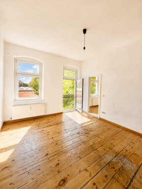 Wohnzimmer.png - Ruhige 2-Zimmer-Altbauwohnung mit Dielenboden und Blick ins Grüne
