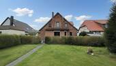 Garten - 9 Zimmer Mehrfamilienhaus, Wohnhaus zum Kaufen in Wennigsen