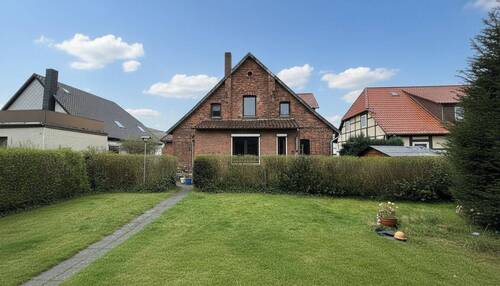Garten - 9 Zimmer Mehrfamilienhaus, Wohnhaus zum Kaufen in Wennigsen