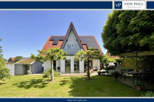 Bild 1 - Energiebewusstes Wohnen: Modern ausgestattetes Einfamilienhaus mit Traumgarten in Jeinsen!