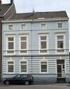 Straßenansicht - Attraktive Erdgeschosswohnung mit Garten und Garage