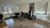 EG Blick ins Wohnzimmer mit Kamin - 