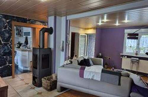 Wohnzimmer EG mit Kamin - 