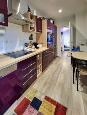 Küche mit Frühstückstisch - Etagenwohnung mit 70,00 m² in Wiesbaden zum Kaufen