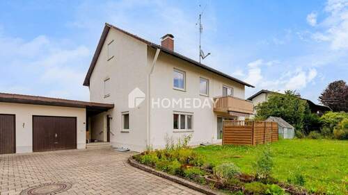 Außenansicht 2 - Familienfreundliches EFH mit großzügiger Südost-Terrasse, Garten und zwei Garagen