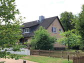 Seitenansicht vom Haus - 6 Zimmer Mehrfamilienhaus, Wohnhaus in Buchholz