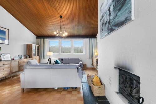 Wohnzimmer mit Kamin - Reihenendhaus mit 147,00 m&sup2; in Gummersbach zum Kaufen