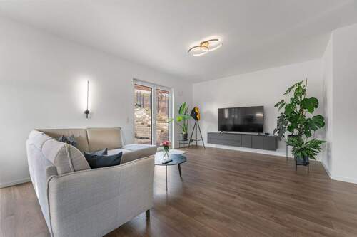 Wohnzimmer - 4 Zimmer Einfamilienhaus zum Kaufen in Breckerfeld